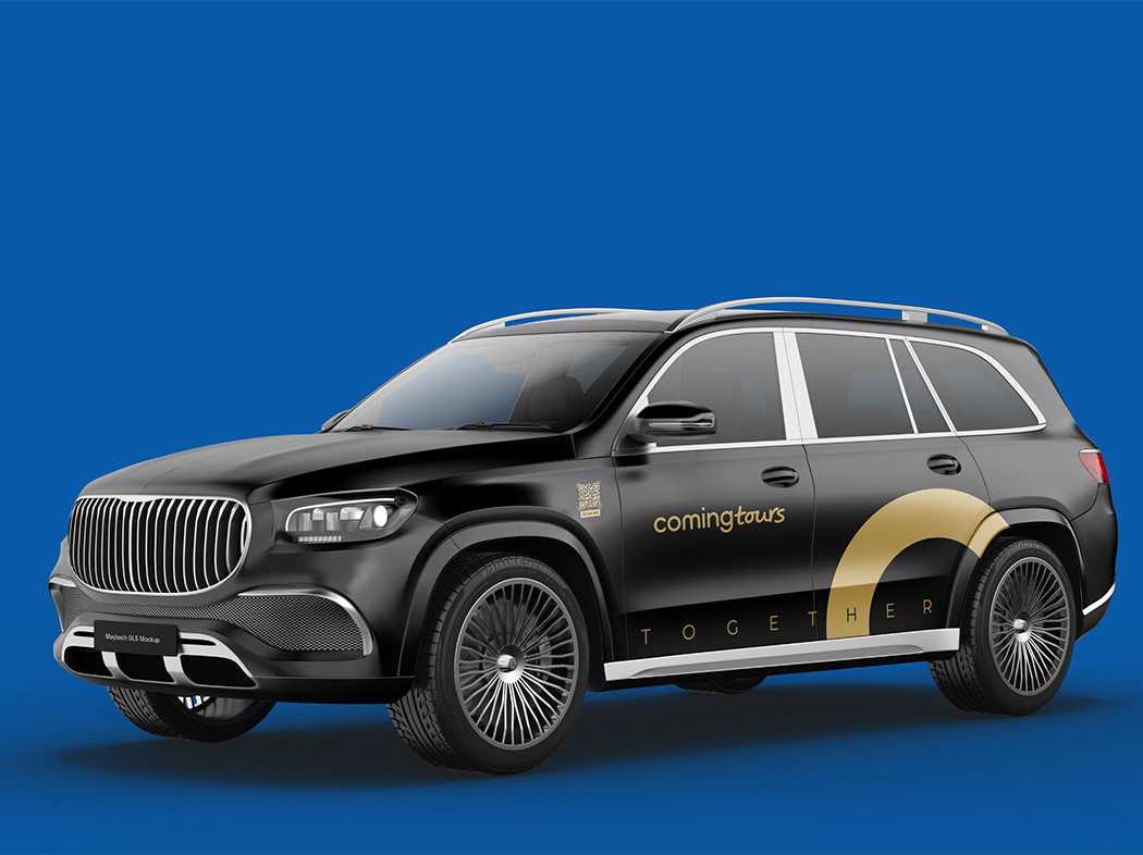Black vehicle branded with the Coming Tours visual identity
